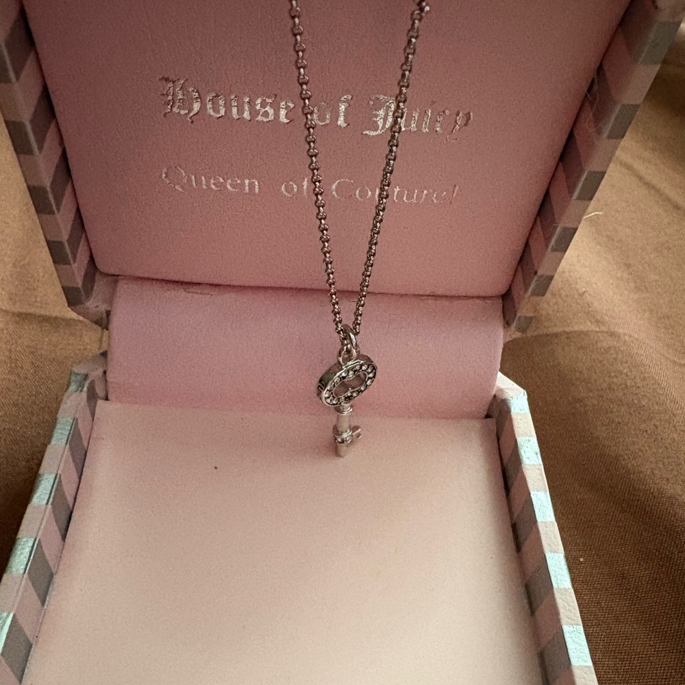 Juicy Couture key pendant necklace.